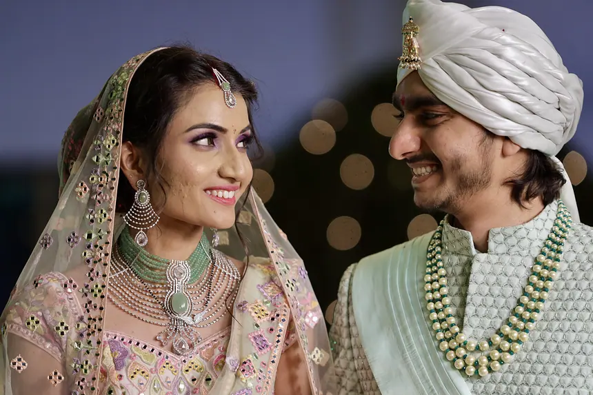 Bride and groom smiling, close-up portrait