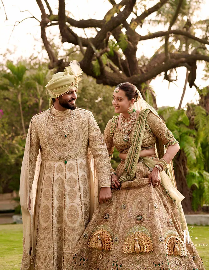 Groom and bride in matching gold